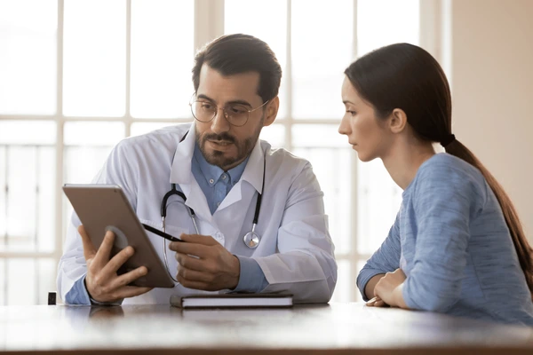 Person adding age and medications to personalize results on mobile